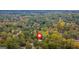 Aerial view of house surrounded by lush trees at 2147 Mcafee Rd, Decatur, GA 30032