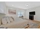 Spacious main bedroom with large bed and hardwood floors at 2147 Mcafee Rd, Decatur, GA 30032