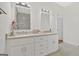 Double vanity bathroom with white cabinets and granite countertop at 2147 Mcafee Rd, Decatur, GA 30032