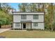 Modern two-story house with white siding and black accents at 2147 Mcafee Rd, Decatur, GA 30032
