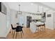 Open concept kitchen with island and breakfast bar at 2147 Mcafee Rd, Decatur, GA 30032