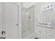 Clean bathroom with walk-in shower and white vanity at 2147 Mcafee Rd, Decatur, GA 30032