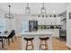 White kitchen with island and breakfast bar at 2147 Mcafee Rd, Decatur, GA 30032