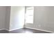 Bedroom with hardwood floors and window at 1986 Patterson Park Pl, Lawrenceville, GA 30044