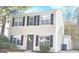 Two-story house with beige siding, black shutters at 1986 Patterson Park Pl, Lawrenceville, GA 30044