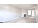 Living room with fireplace and neutral decor at 1986 Patterson Park Pl, Lawrenceville, GA 30044