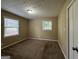 Cozy bedroom with carpet and ample natural light at 2929 Stratford Mill Rd, Lithonia, GA 30038