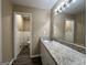 Bathroom with granite countertop, white cabinets and a separate toilet area at 2929 Stratford Mill Rd, Lithonia, GA 30038