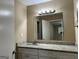 Bathroom with granite countertop and white cabinets at 2929 Stratford Mill Rd, Lithonia, GA 30038