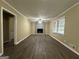Living room with fireplace and hardwood floors at 2929 Stratford Mill Rd, Lithonia, GA 30038