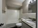 Clean bathroom with a shower/tub combo and granite vanity at 2929 Stratford Mill Rd, Lithonia, GA 30038