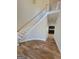 Bright entryway with hardwood floors and a grand staircase at 275 Allie Dr, Mcdonough, GA 30252