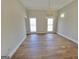Formal dining room with hardwood floors and a chandelier at 275 Allie Dr, Mcdonough, GA 30252