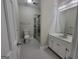 Updated bathroom features a walk-in shower, toilet, and vanity with a large mirror at 275 Allie Dr, Mcdonough, GA 30252