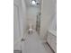 Clean bathroom with gray tile floors and a shower/tub combo at 275 Allie Dr, Mcdonough, GA 30252