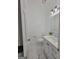 Modern bathroom with white vanity and marble floors at 275 Allie Dr, Mcdonough, GA 30252