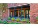 Brick patio with French doors leading to the backyard at 5102 Park Sw St, Covington, GA 30014