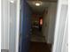 Home entryway with hardwood floors and view into living room at 440 Falling Leaf Ct, Mcdonough, GA 30253