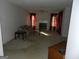 Living room featuring carpet, fireplace, and window curtains at 440 Falling Leaf Ct, Mcdonough, GA 30253