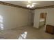 Spacious bedroom with ceiling fan and access to bathroom at 440 Falling Leaf Ct, Mcdonough, GA 30253