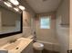 Updated bathroom with a bathtub, sink, and modern fixtures at 3168 Mcafee Rd, Decatur, GA 30032