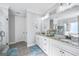 Elegant bathroom with granite countertops and a walk-in shower at 92 Gordon Oaks Way, Moreland, GA 30259