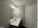 Bathroom with vanity, white countertop and mirror at 208 Rankin Cir, Mcdonough, GA 30253