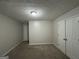 Bright bedroom featuring double closets and neutral walls at 208 Rankin Cir, Mcdonough, GA 30253