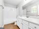 Bathroom with white tile shower and vanity at 138 Michelle Dr, Mcdonough, GA 30252