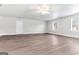 Large bedroom with hardwood floors, ceiling fan and lots of natural light at 138 Michelle Dr, Mcdonough, GA 30252