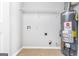 Laundry room with shelving and new water heater at 138 Michelle Dr, Mcdonough, GA 30252