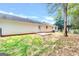 Rear view of a single-story house with a patio and a fenced yard at 138 Michelle Dr, Mcdonough, GA 30252