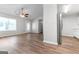 Bright dining area with hardwood floors and access to kitchen at 138 Michelle Dr, Mcdonough, GA 30252