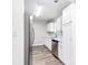 Modern kitchen with stainless steel appliances and white shaker cabinets at 138 Michelle Dr, Mcdonough, GA 30252