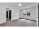 Bright bedroom with grey carpeting and ample closet space at 3569 Lynne Rd, Powder Springs, GA 30127