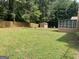 Large backyard with shed and screened porch at 416 Winterwood Dr, Stockbridge, GA 30281