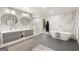 Elegant bathroom with soaking tub and double vanity at 110 River Ne Lndg, Sandy Springs, GA 30350