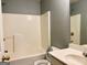 Bathroom with a bathtub, sink, and toilet at 150 Brookview Dr, Riverdale, GA 30274