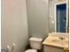 Small half bathroom with toilet and sink at 150 Brookview Dr, Riverdale, GA 30274