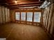 Unfinished basement with framed walls and windows at 608 Cliff Lake Trl, Stockbridge, GA 30281