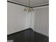 Dining area with black tile floor and a light fixture at 3290 Abbeywood Dr, Decatur, GA 30034