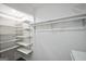 Well-organized closet with shelving and hanging space at 1120 Strath Clyde Way, Mcdonough, GA 30253