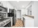 Modern kitchen with stainless steel appliances and white cabinets at 1120 Strath Clyde Way, Mcdonough, GA 30253
