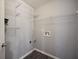 Functional laundry room with shelving and hookups at 1120 Strath Clyde Way, Mcdonough, GA 30253