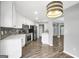 Bright kitchen with stainless steel appliances and an island at 1120 Strath Clyde Way, Mcdonough, GA 30253