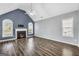 Spacious living room with a fireplace and vaulted ceiling at 1120 Strath Clyde Way, Mcdonough, GA 30253
