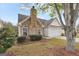 House exterior with stone accents and a two-car garage at 1120 Strath Clyde Way, Mcdonough, GA 30253