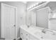 Bathroom with double vanity, marble countertop and shower at 1120 Strath Clyde Way, Mcdonough, GA 30253