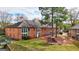 Brick building with a gazebo in the backyard at 312 Brittany Ct, Duluth, GA 30096