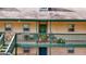 Exterior view of building with balcony and green door at 312 Brittany Ct, Duluth, GA 30096